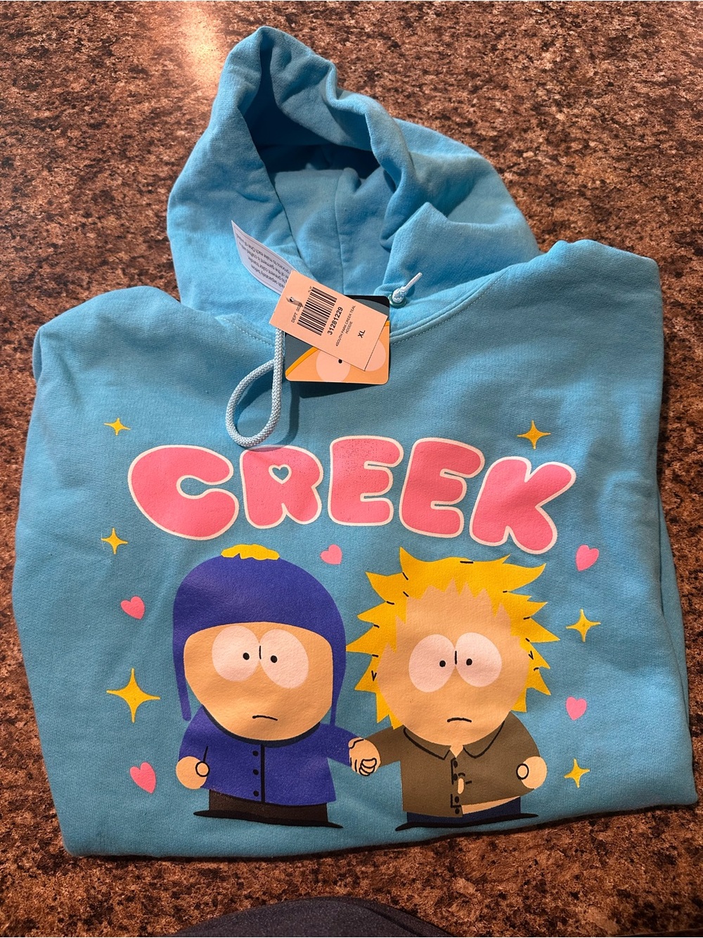 Teal Graphic Hoodie with 'CREEK' Cartoon Print
